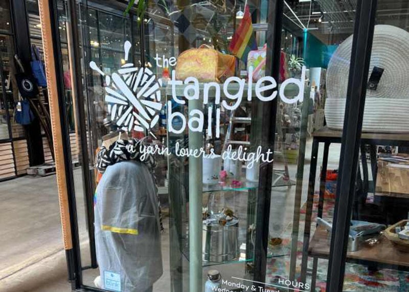 The Tangled Ball window signage